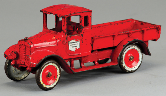 Donald Kaufman’s first toy purchase, a circa-1922 International Harvester “Red Baby” truck, estimate $400-$600. Bertoia Auctions image.